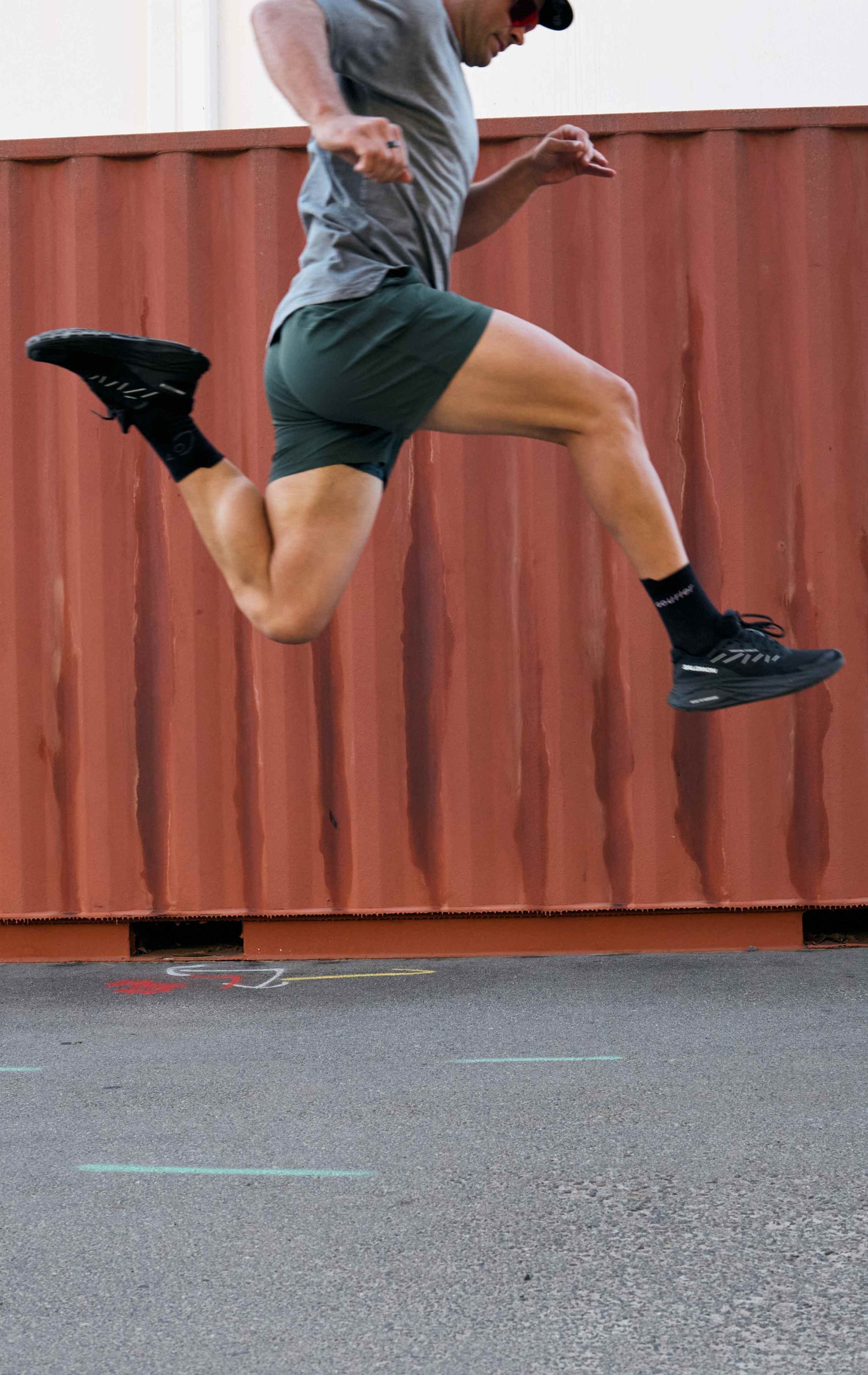 runner jumping while wearing courier LoFi athletic black socks